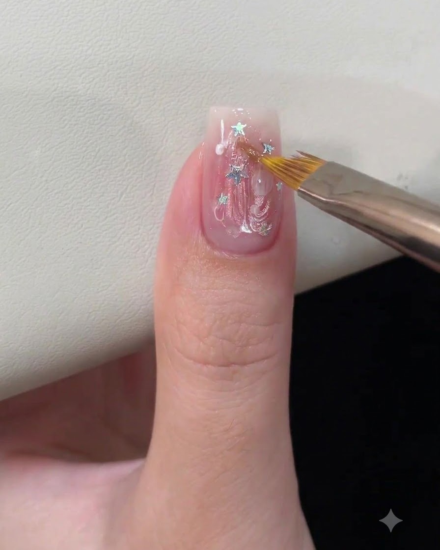 A close-up of a fingernail with 3D water ripple gel art placed inside a UV or LED nail lamp for curing.
